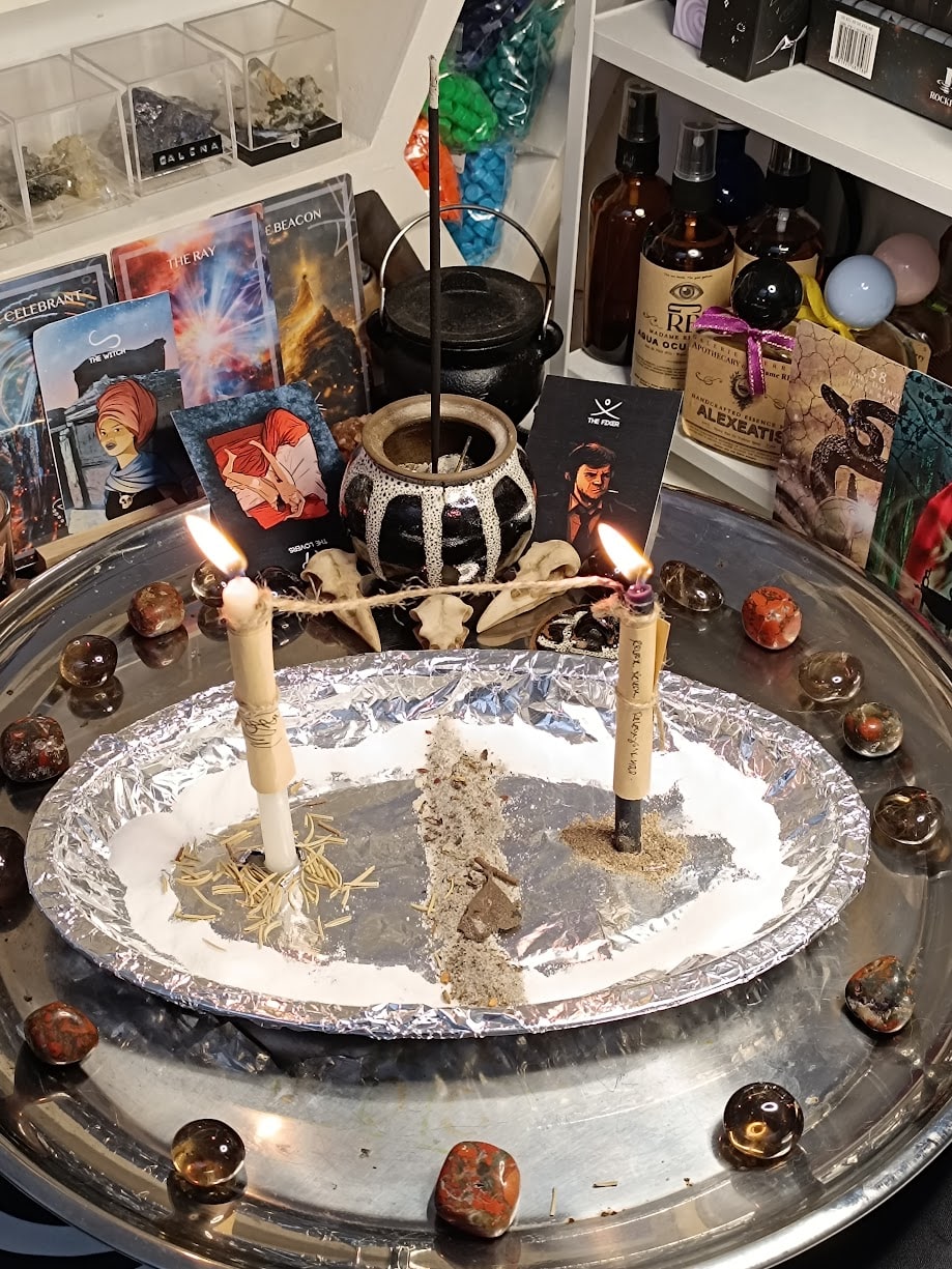 Cord-cutting candles arranged for the Rite of Reclamation