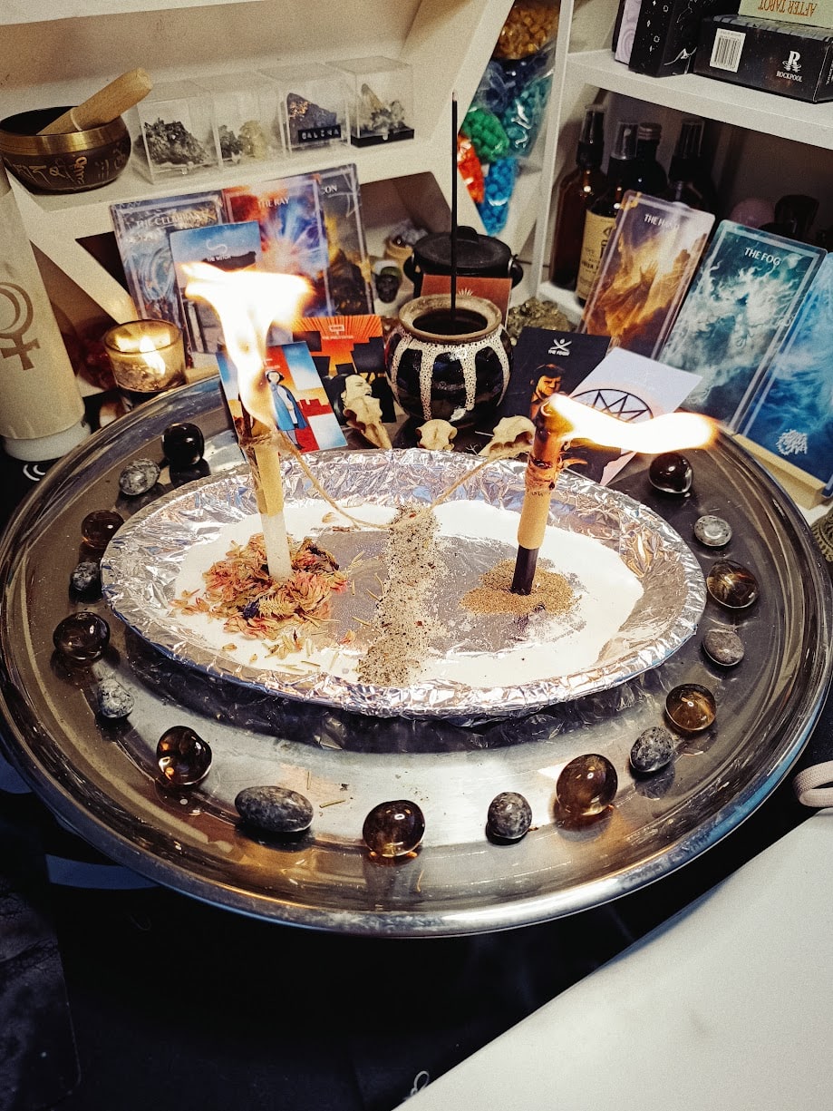 Flaming cord-cutting candles prepared for the Rite of Release